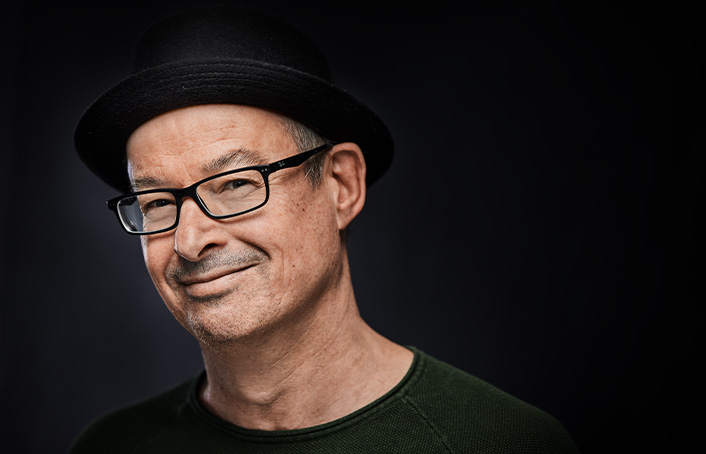 Ansprechpartner Peter Finsterwalder, der freundlich und leicht verschmitzt lächelt